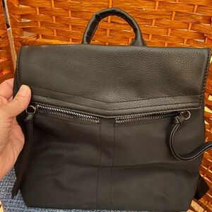 Black Leather Backpack with Structured Design
